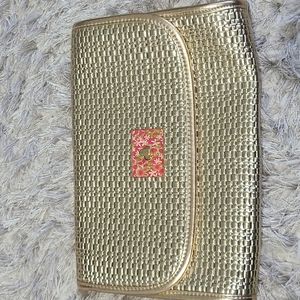 Lilly Pulitzer gold leather clutch
